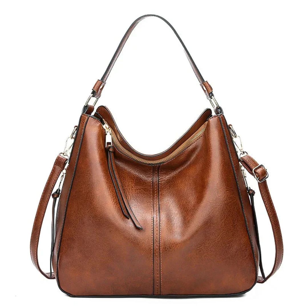 Ersilia Elegant leather bag with large capacity and side pockets