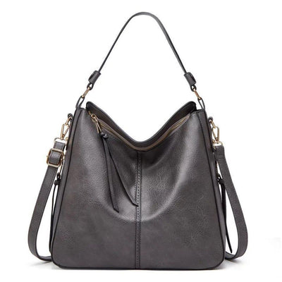 Ersilia Elegant leather bag with large capacity and side pockets