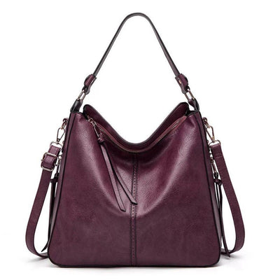 Ersilia Elegant leather bag with large capacity and side pockets